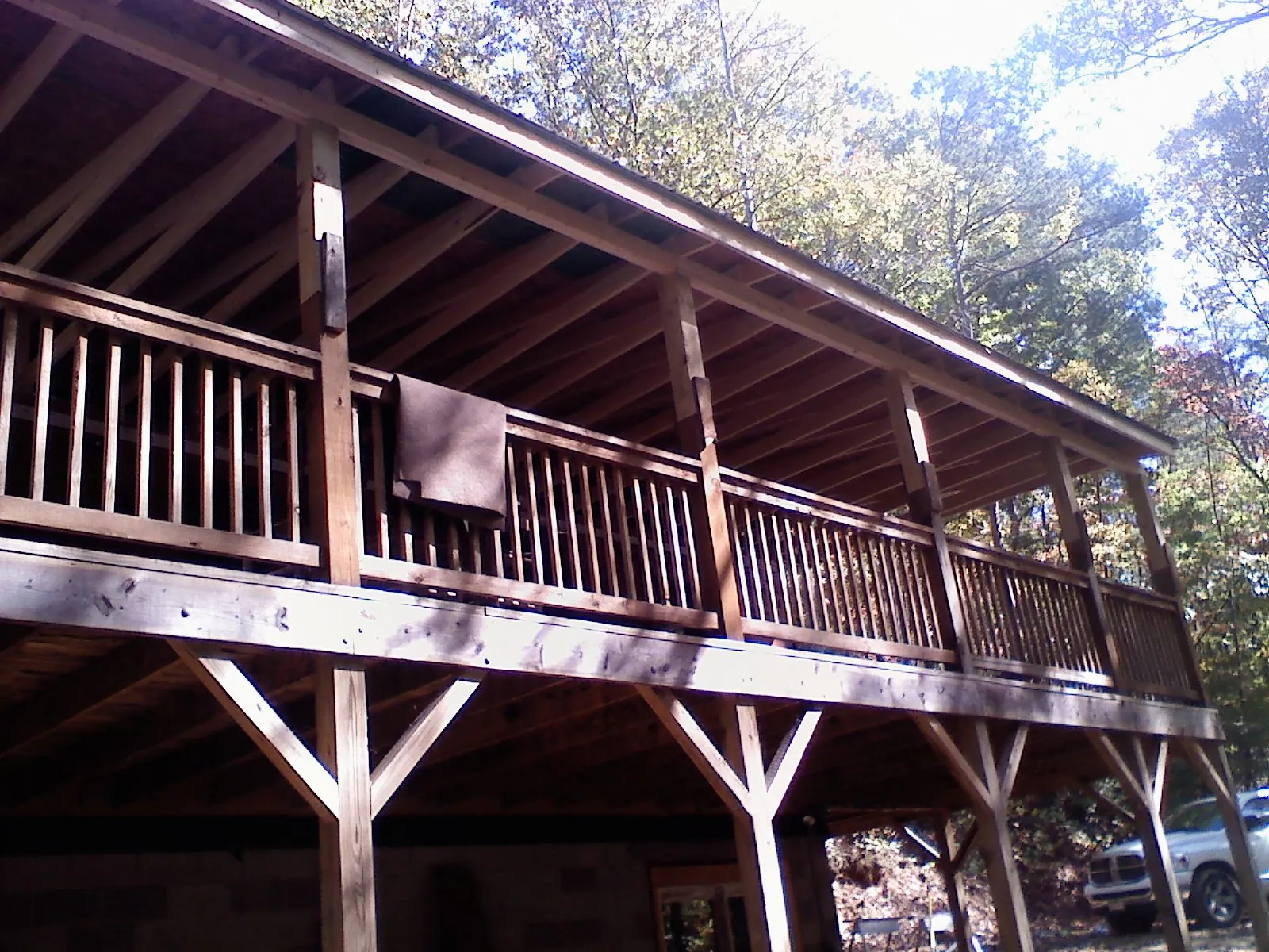 Timber framing under a new elevated porch and deck — Roof Leak Repair in Hartford by Roofing Brothers